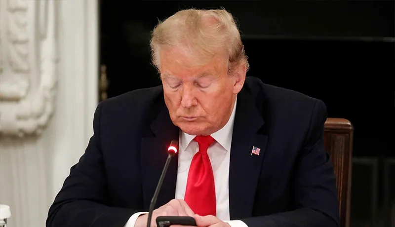 Trump using his phone